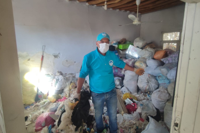 Evinden 8 Kamyon Çöp Çıkarıldı